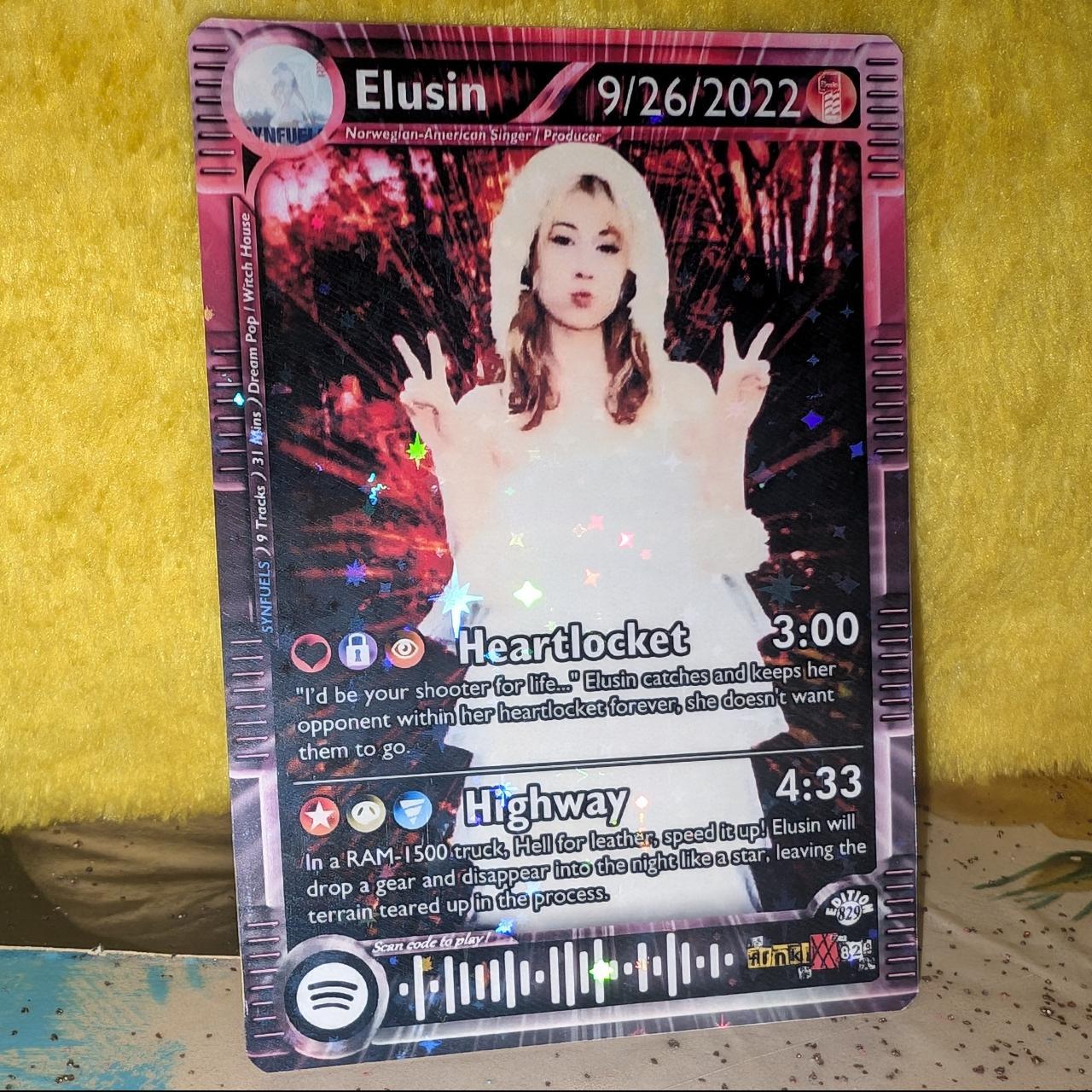 Elusin Holographic Trading Card