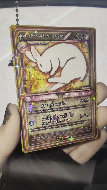 Your Arms Are My Cocoon Holographic Trading Card
